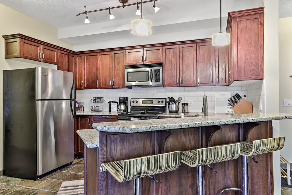 Kitchen with new Paderno pots, pans and knives. Locally-roasted Eclipse coffee.