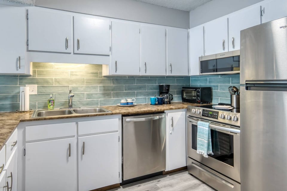 Cook up your favorites in this stocked kitchen.