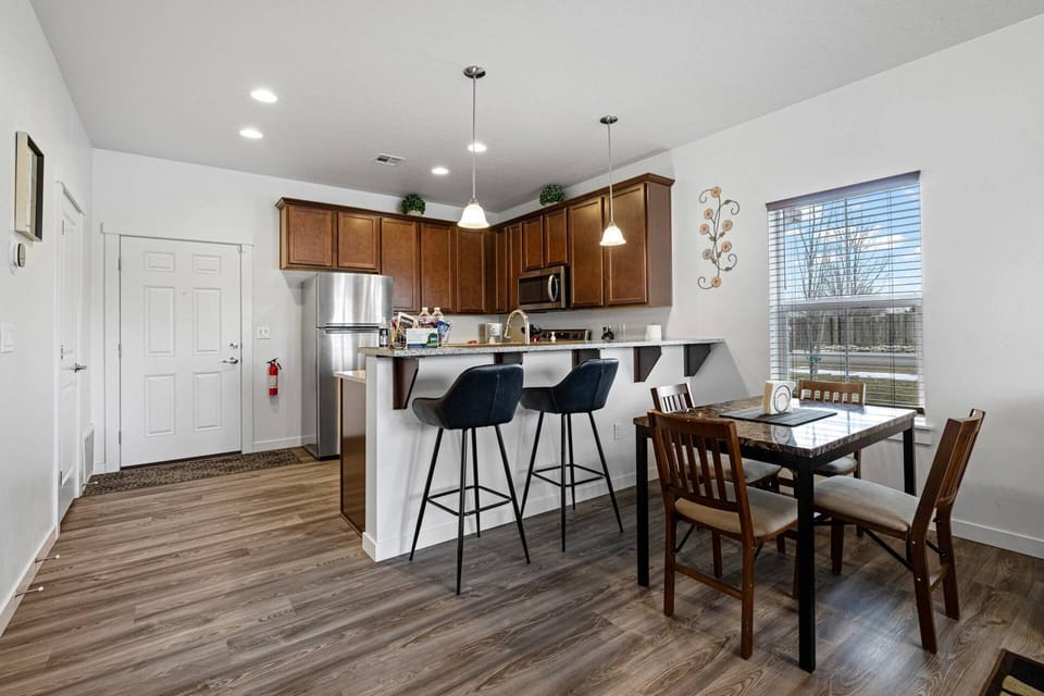Sit at the kitchen bar or dining table