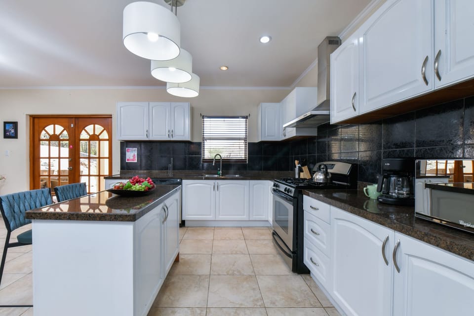 Discover culinary convenience in our fully equipped kitchen, where every tool and appliance awaits your culinary creations.