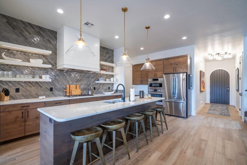Large kitchen stocked with appliances and utensils for cooking