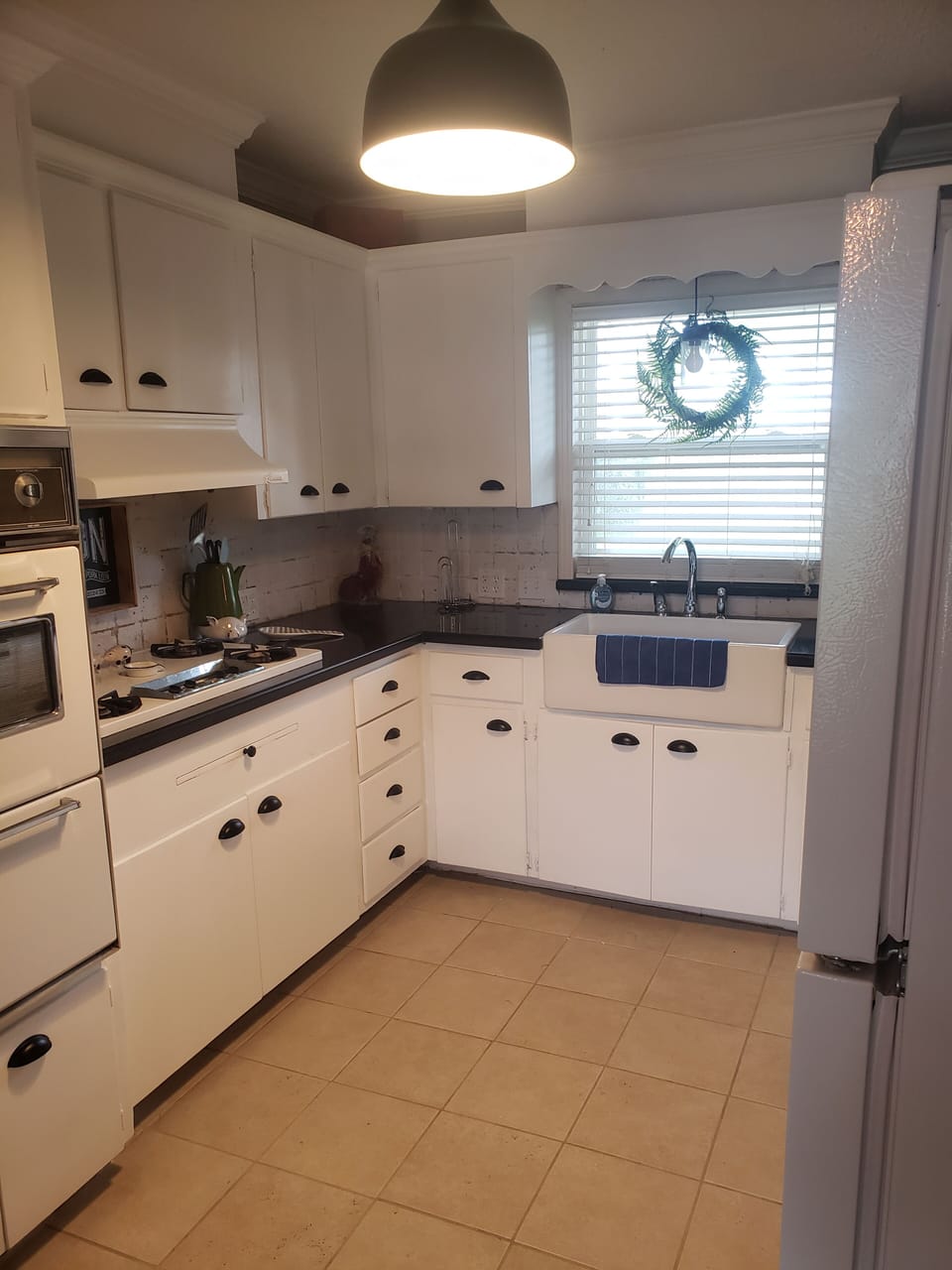 Kitchen
Antique gas oven and stove.  Counter top electric included.