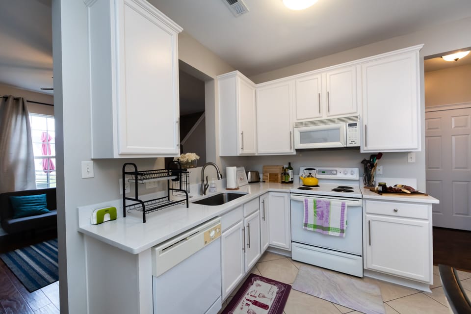 The kitchen is equipped with everything you may need to make this feel like home