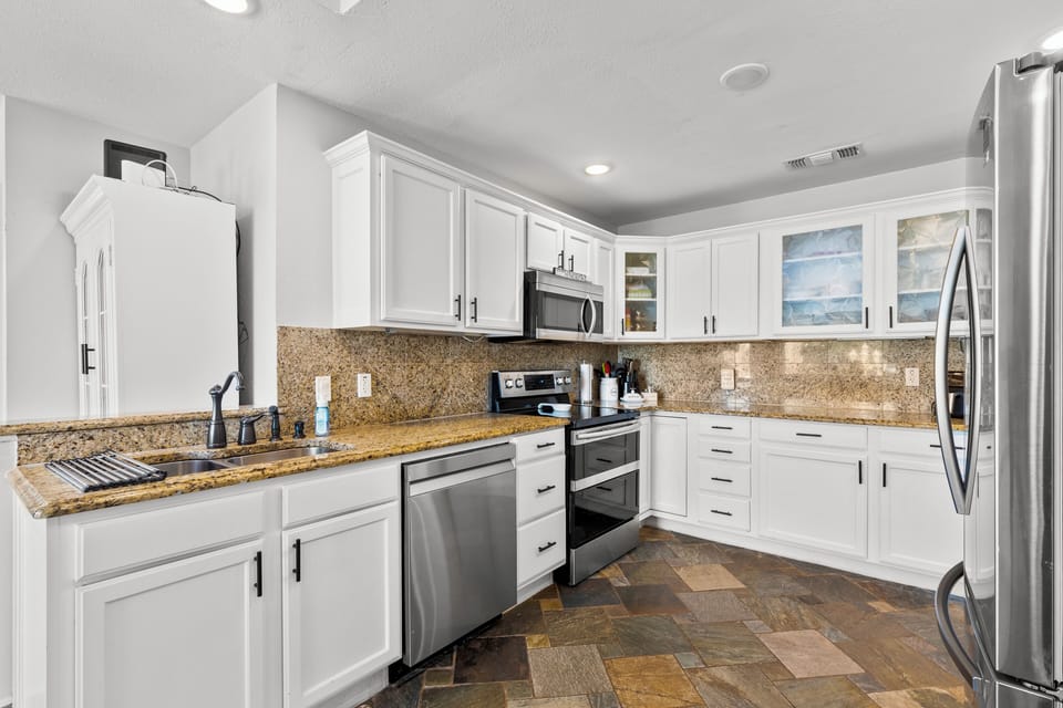 Fully stocked kitchen has everything you need for cooking and entertaining.