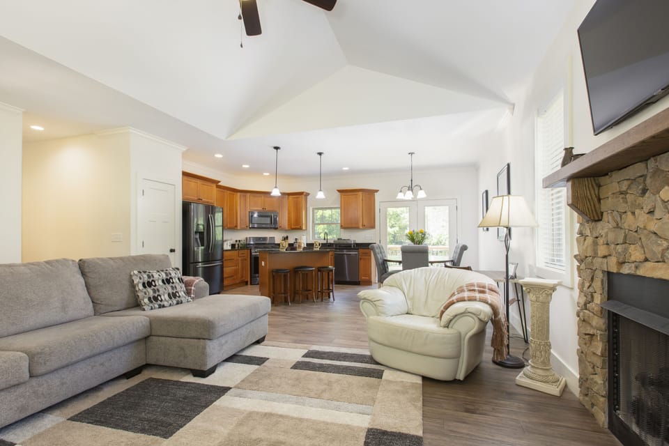 Warm up by the gas log fireplace.  Smart TV too!