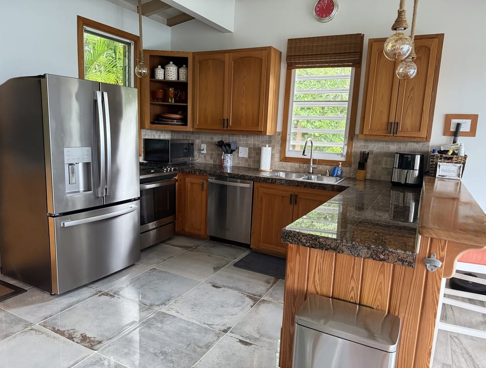 Well-stocked kitchen with updated appliances.