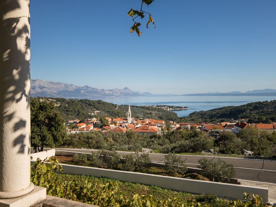 Sky, Water, Daytime, Plant, Azure, Botany, Vegetation, Building, Mountain, Landscape