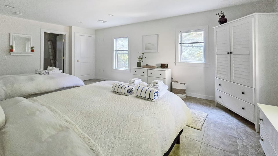 Bedroom with two queen beds and ensuite bathroom