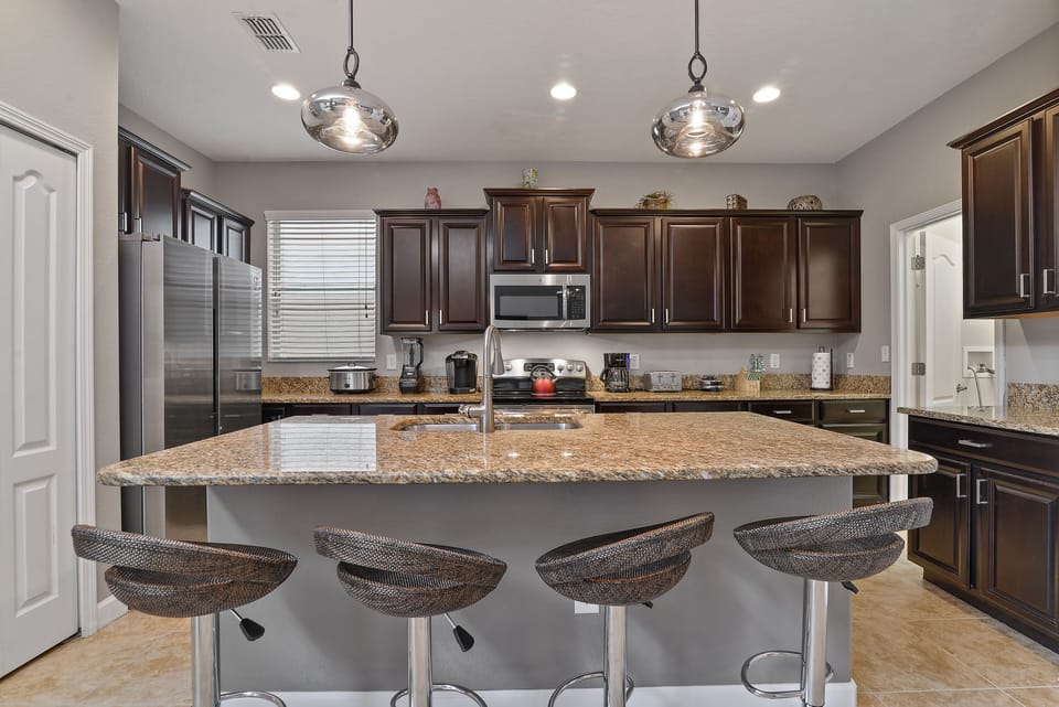 Brand new stainless steel appliances in a FULLY stocked kitchen 