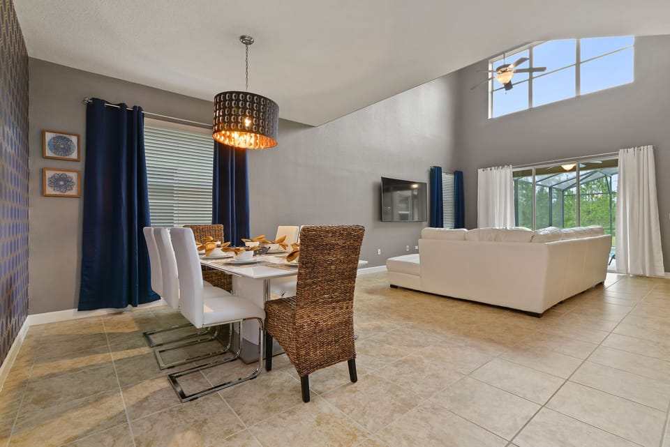 Soaring ceilings in the sun drenched family room! Open to everything 