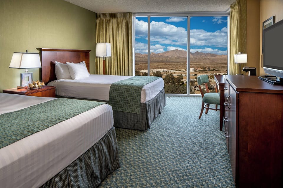 Wake up to sweeping mountain views from your plush beds