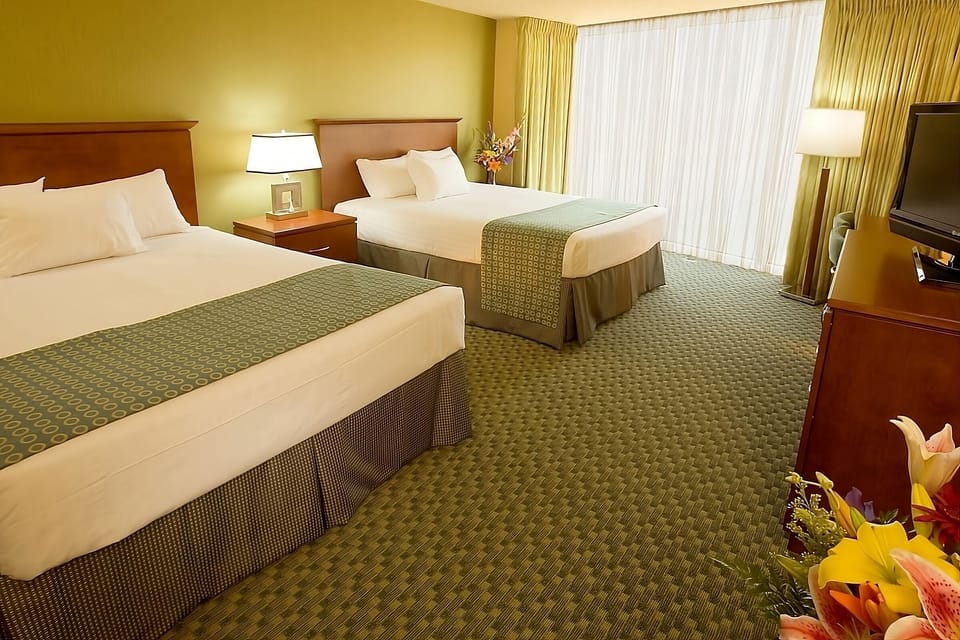 Drift off easily in a bright double-queen room