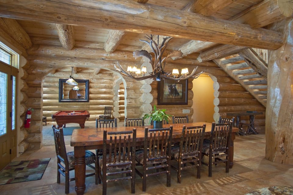 The dining area has a copper topped dining room table that seats 12.