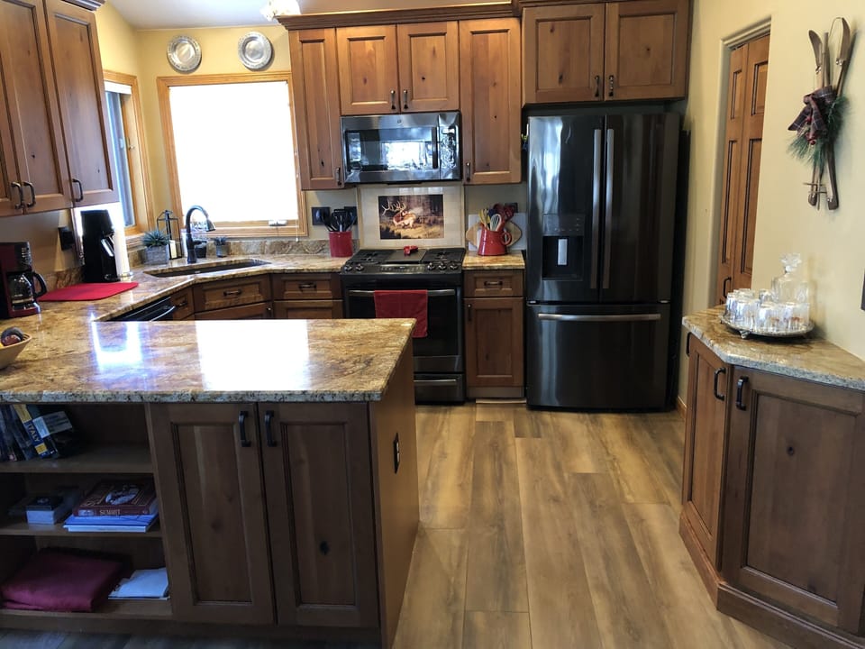 Kitchen with new appliances, fully stocked with everything, gas stove.
