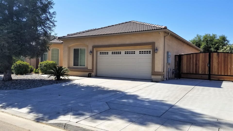 Our driveway can fit up to 3 mid sized vehicles