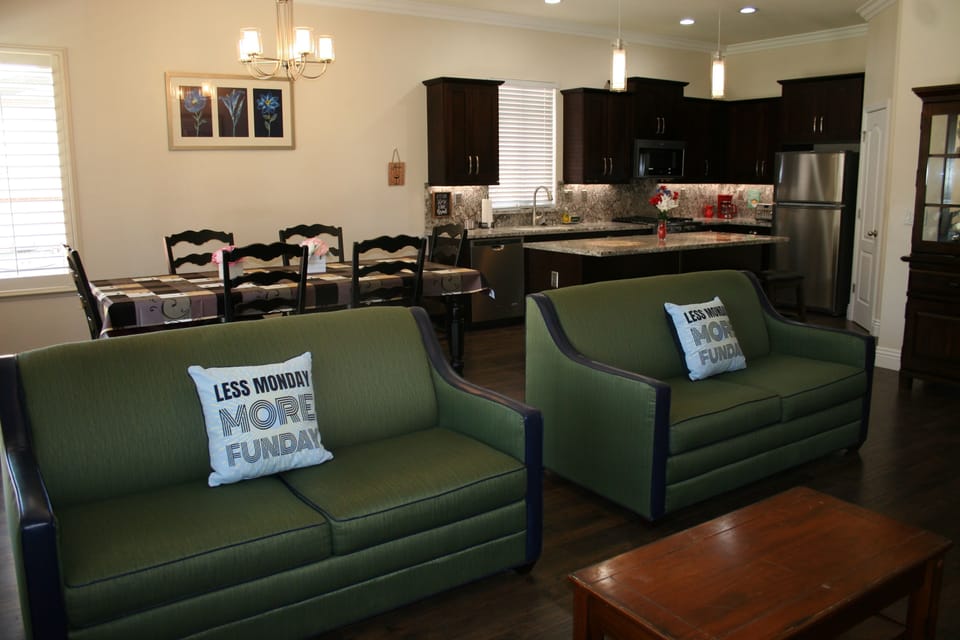 The living room sofas turn into full size sofa beds for extra sleeping space