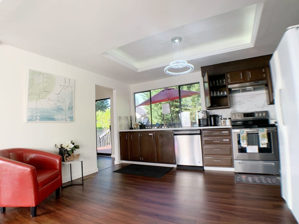 Open concept kitchen - fully equipped with coffee markers and spices