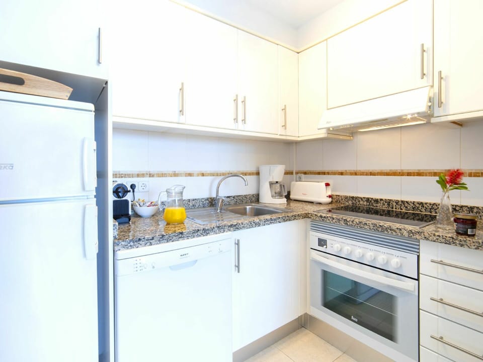 Cabinetry, Countertop, Kitchen Stove, Gas Stove, Kitchen, Kitchen Appliance, Cooktop, Home Appliance, Stove, Interior Design