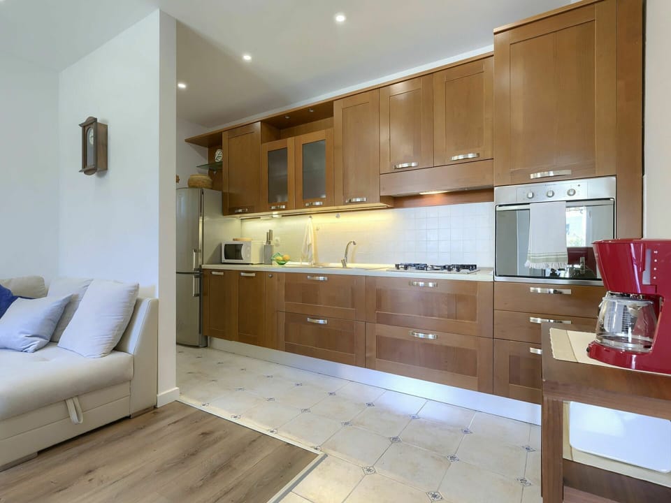 Cabinetry, Countertop, Furniture, Building, Tap, Couch, Wood, Drawer, Interior Design, Kitchen Appliance