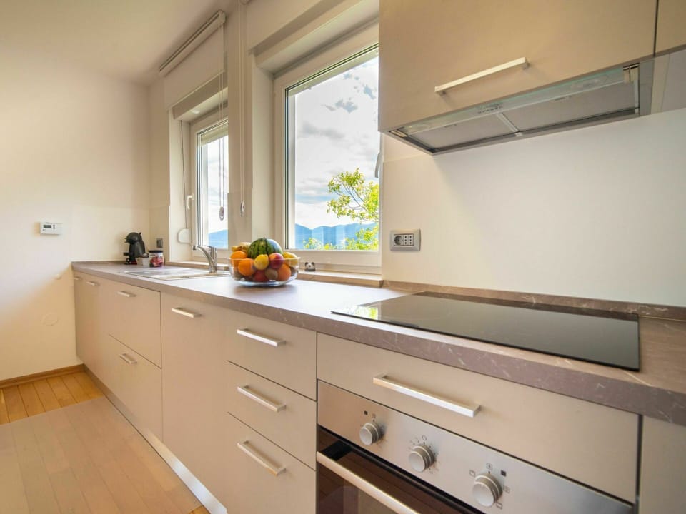 Cabinetry, Property, Furniture, Building, Countertop, Drawer, Window, Wood, Interior Design, Flooring
