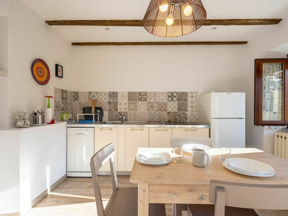 Furniture, Cabinetry, Table, Wood, Picture Frame, Interior Design, Lighting, Kitchen, Floor, Flooring