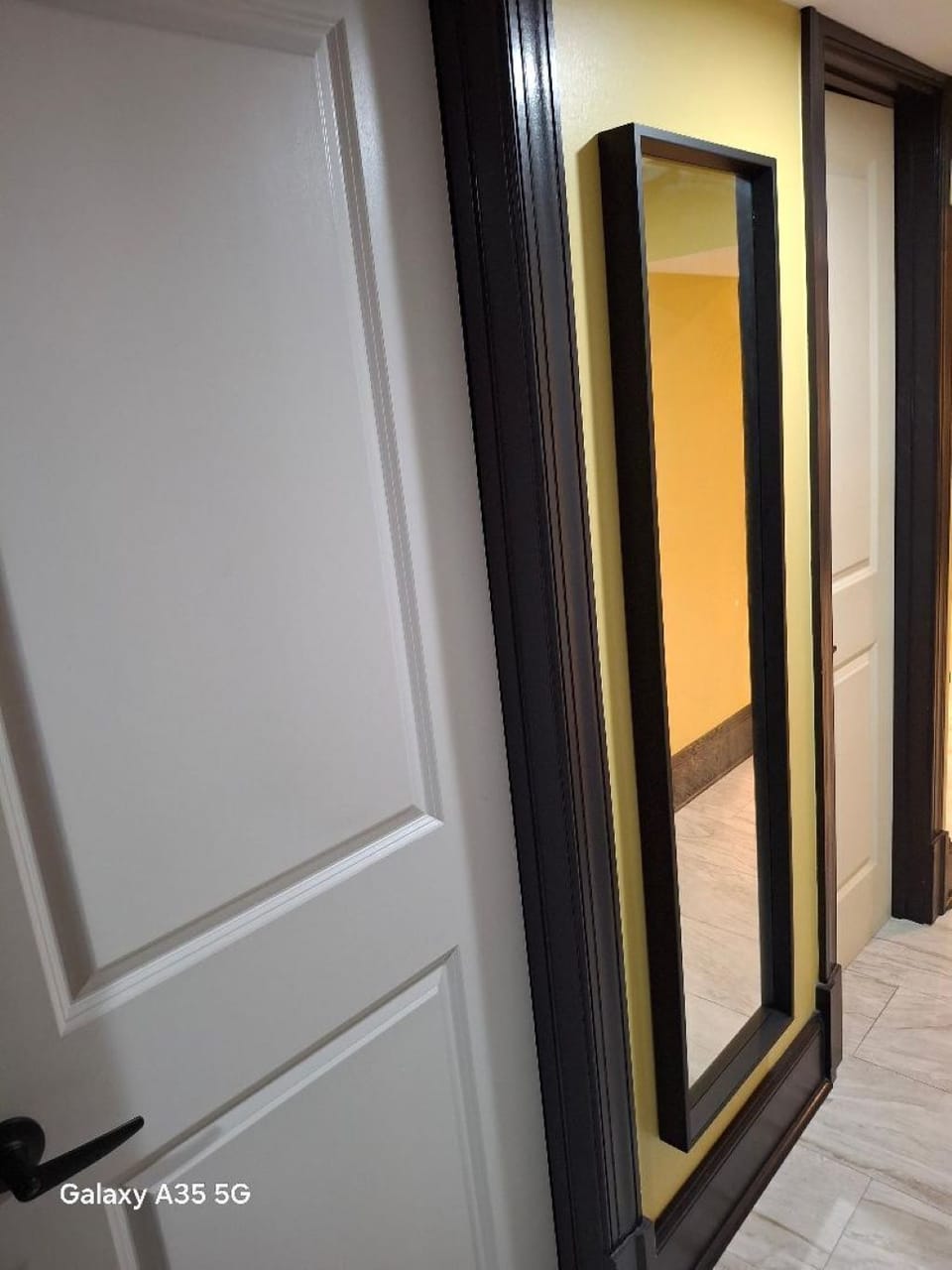 Full length mirror in the lower level (basement).