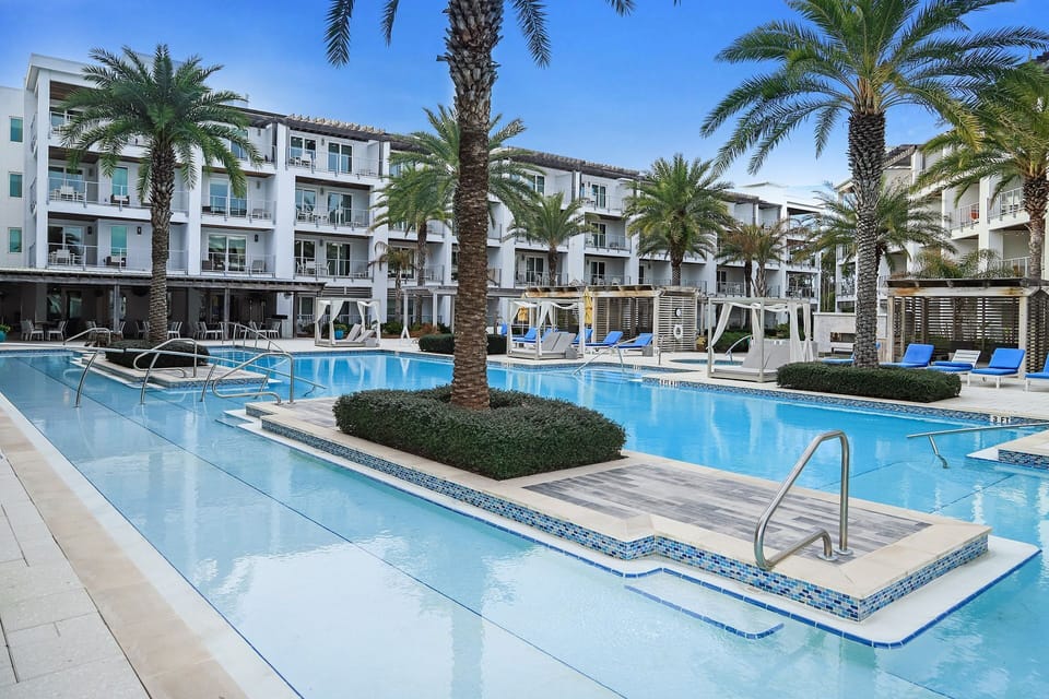 The resort style pool is seasonally heated and features private