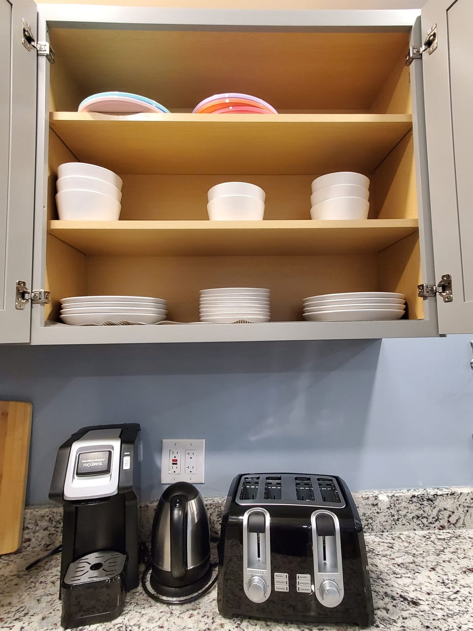 dinner plates/bowls, single serve coffee maker, toaster, kettle