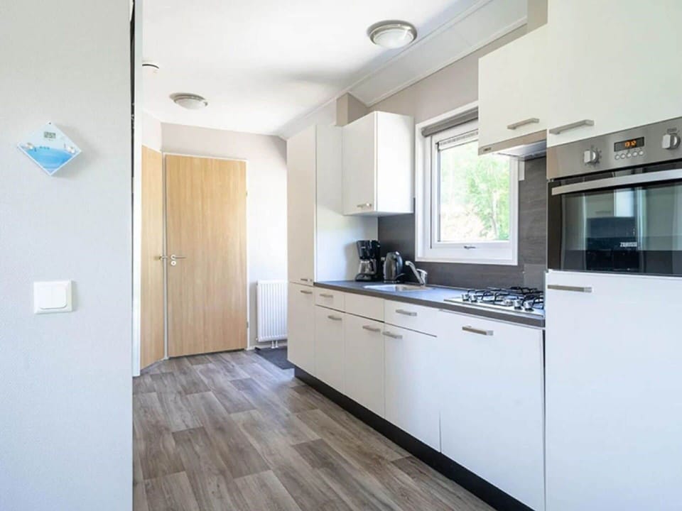 Cabinetry, Countertop, Property, Furniture, Kitchen Sink, Tap, Building, Sink, Kitchen Appliance, Kitchen Stove