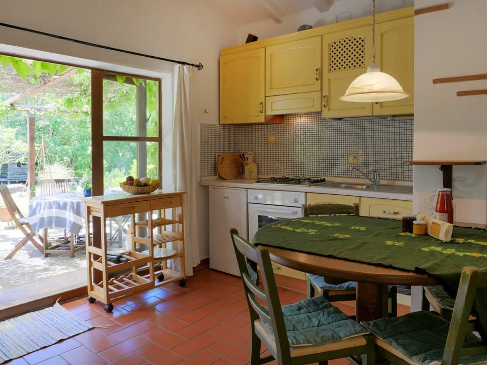 Property, Table, Furniture, Cabinetry, Countertop, Wood, Interior Design, Kitchen Appliance, Kitchen, Architecture