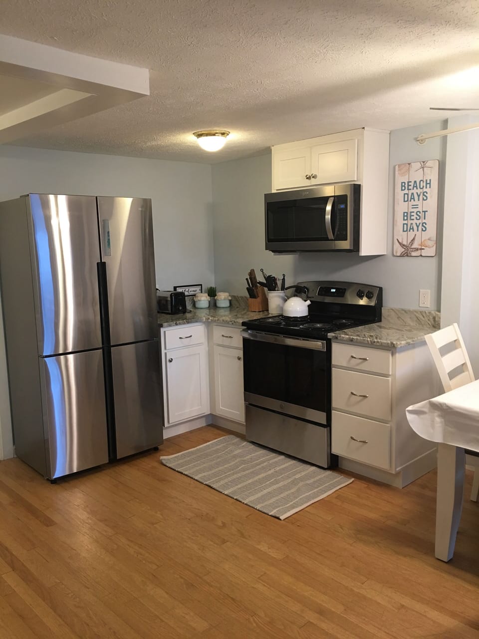 Kitchen with brand new cabinets, countertops, and appliances 
