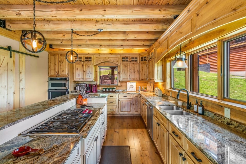 Gorgeous gourmet kitchen w/granite countertops & a high end Wolf gas cook top