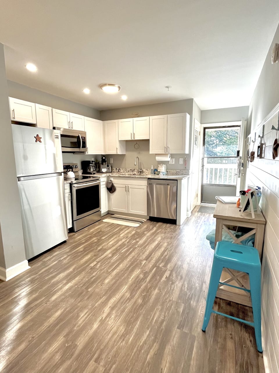 Fully stocked cabinets of kitchen ware for your use.  