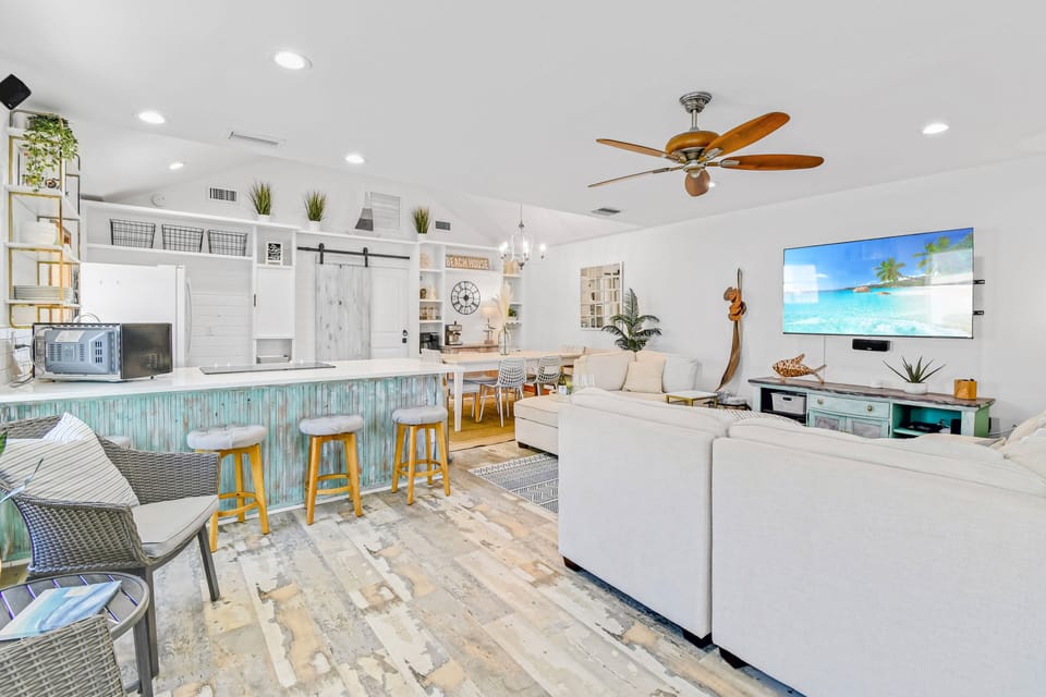 Bright open concept living/kitchen/dining; seating for 10, island + dining table