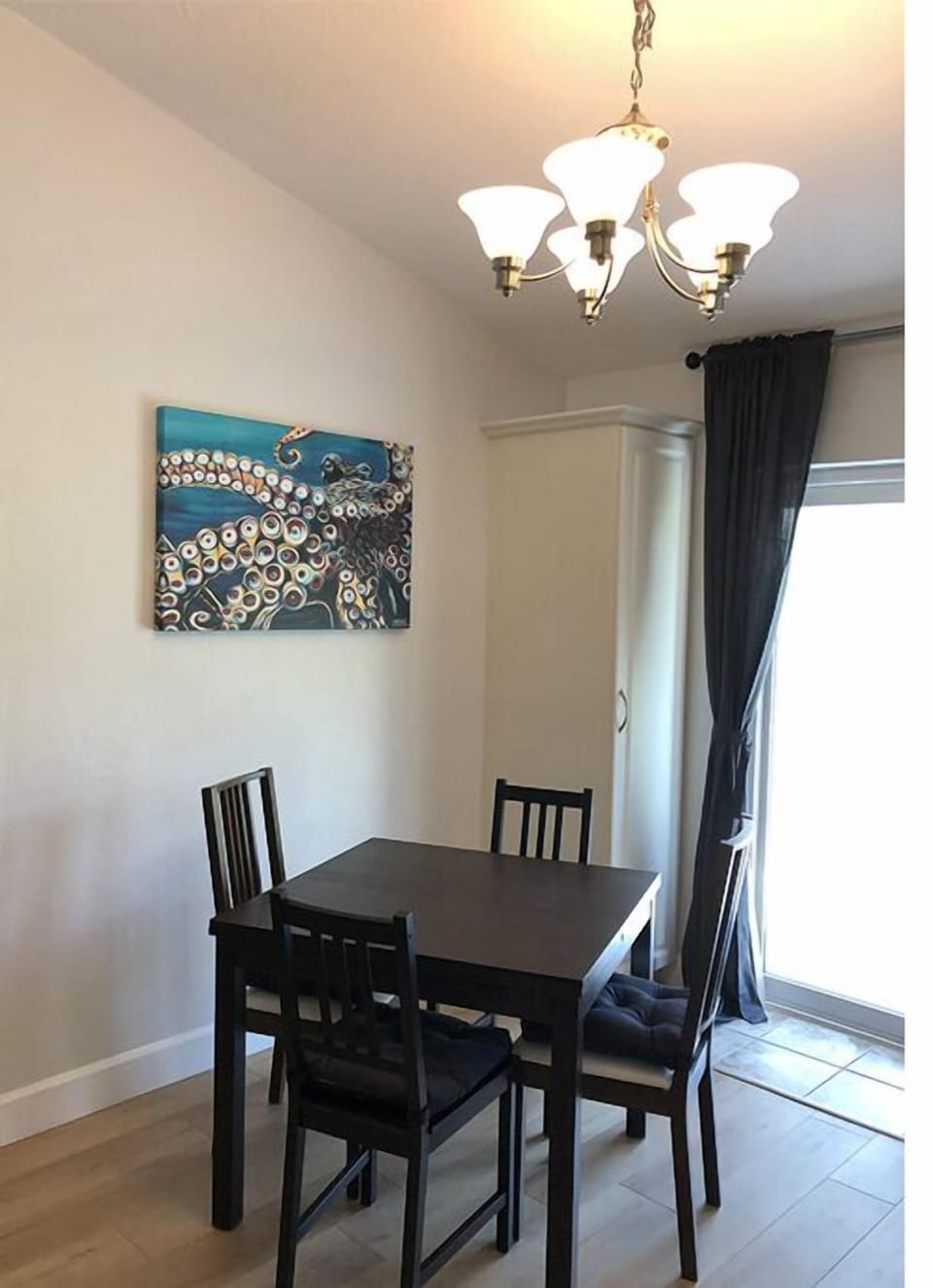 Table expands lengthwise with self-storing  leaves under the top.