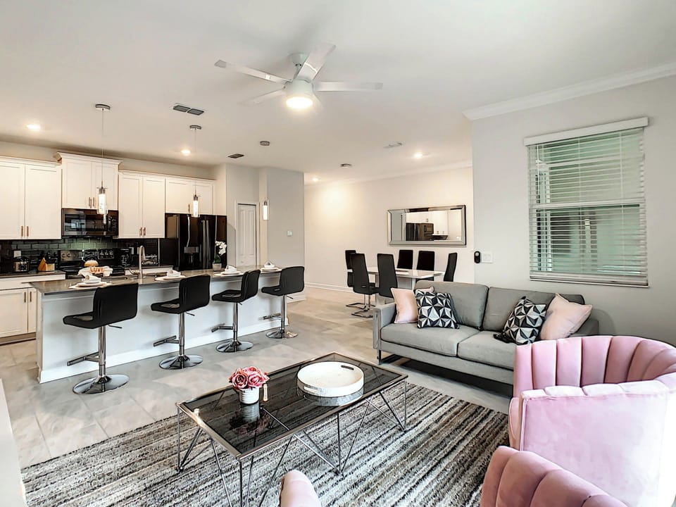 Open-Concept Living Area with Modern Kitchen and Dining Space