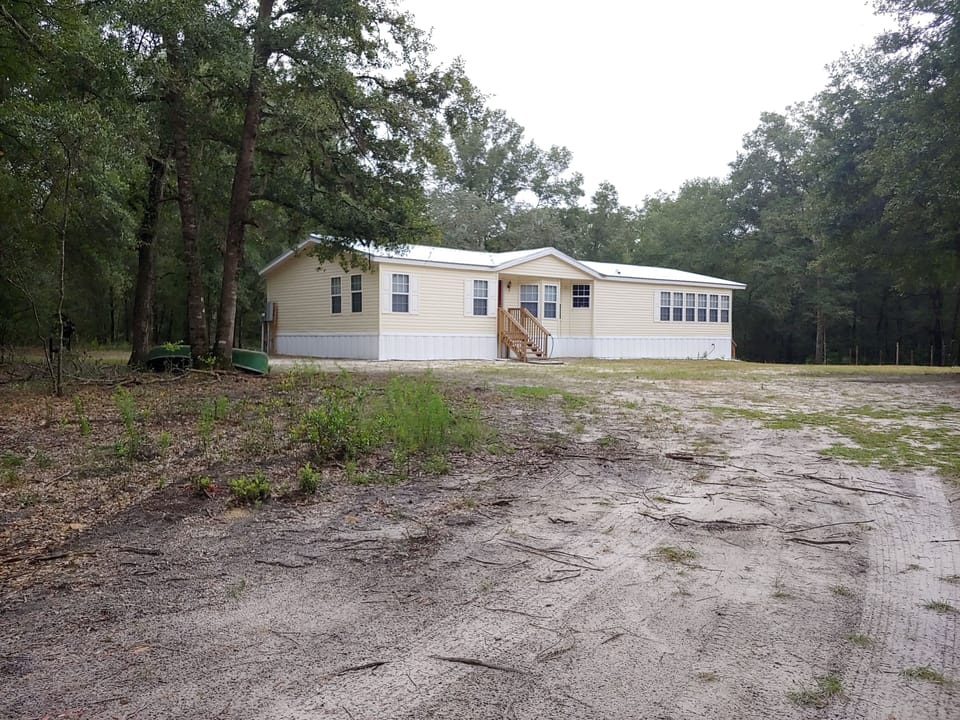 Entire home surrounded by beautiful woods where you often see deer etc.