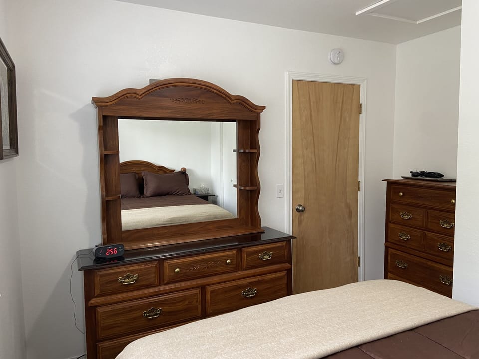 2 dressers in bedroom 