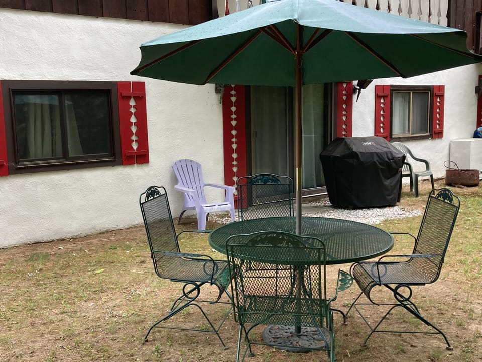Backyard with umbrella table
