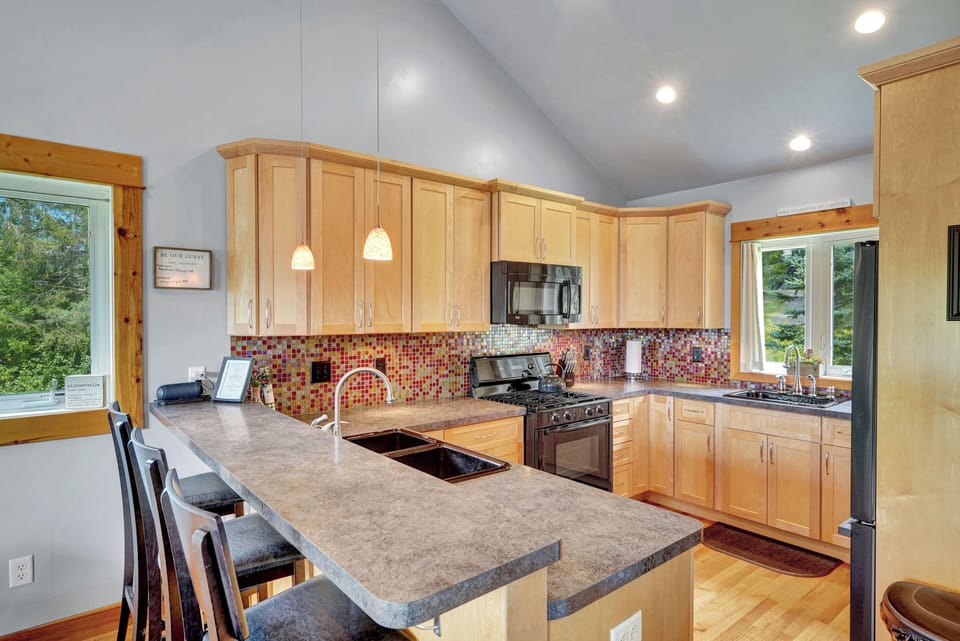 main floor kitchen with 2 sinks