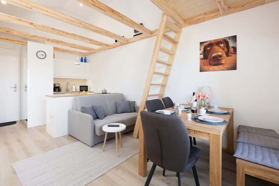 Dining area with wooden table.