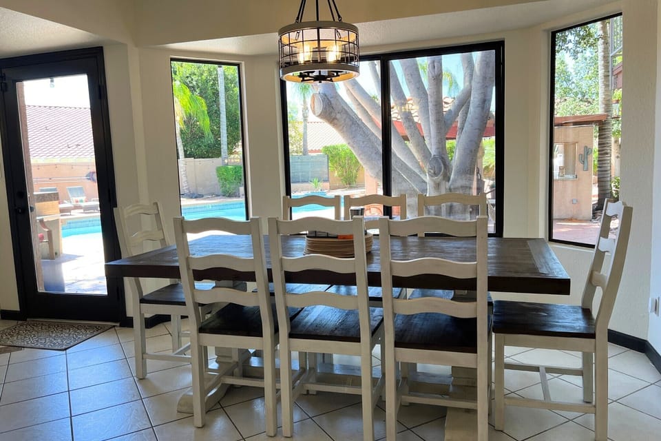 Inside seating area with a beautiful view out to the pool area!