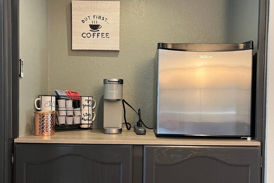 Upstairs coffee bar and mini fridge.