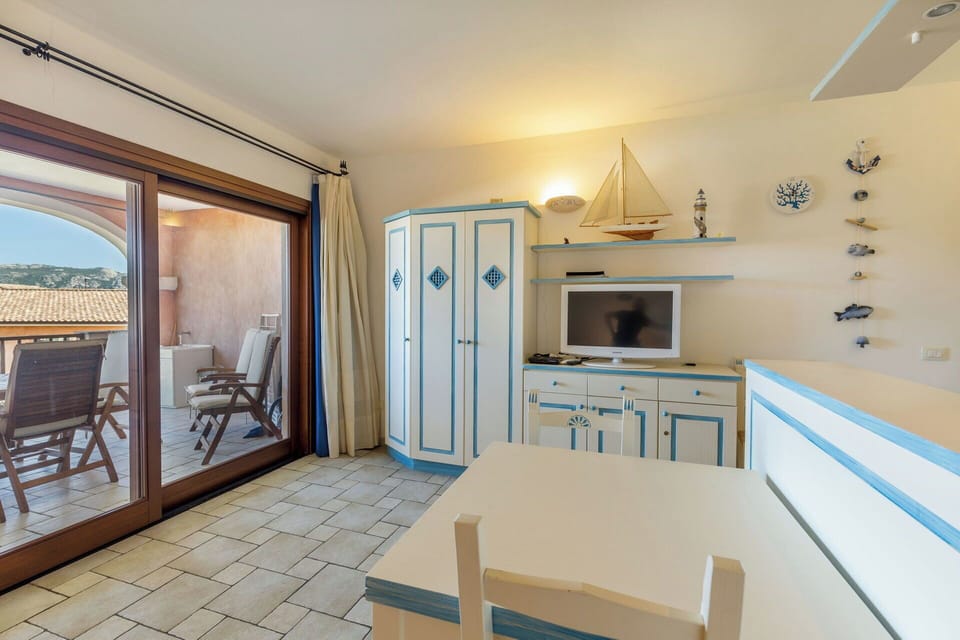 The apartment is on the first floor and has a big sliding window to the terrace with sea view