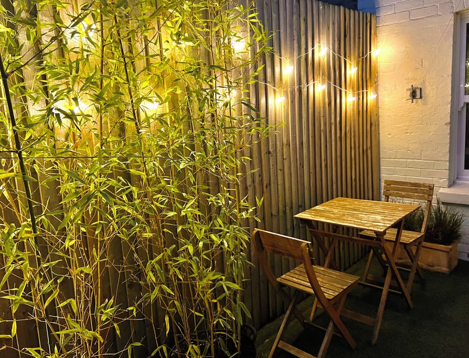 Pretty Fairy Lights at Night by the Bistro Set!