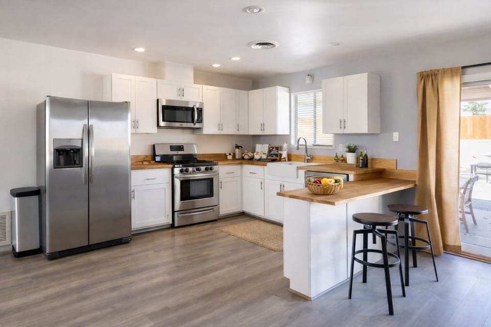 Fully stocked kitchen with modern appliances and generous counter space