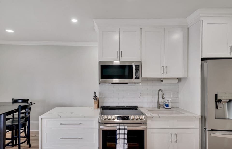 Fully equipped kitchen with user friendly appliances.