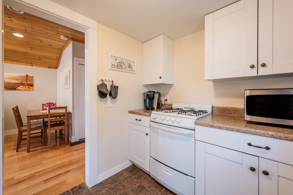 Gas stove and oven. Keurig coffee maker. Microwave. 