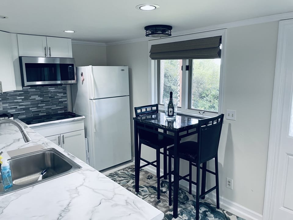 Brand new kitchen with convection /microwave and cook-top