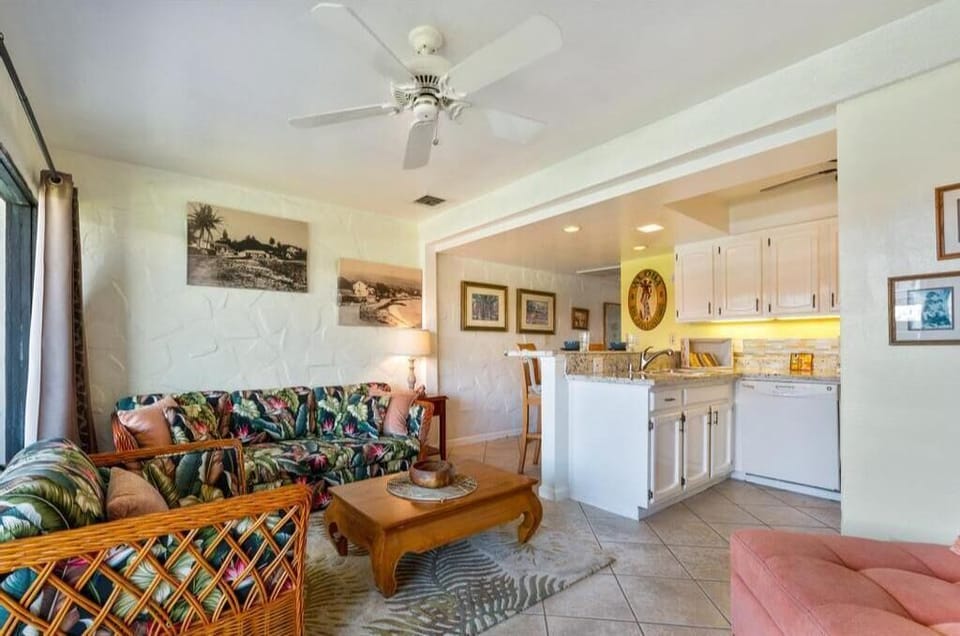 Relax in island comfort with a bright, open-concept living space just steps from the kitchen